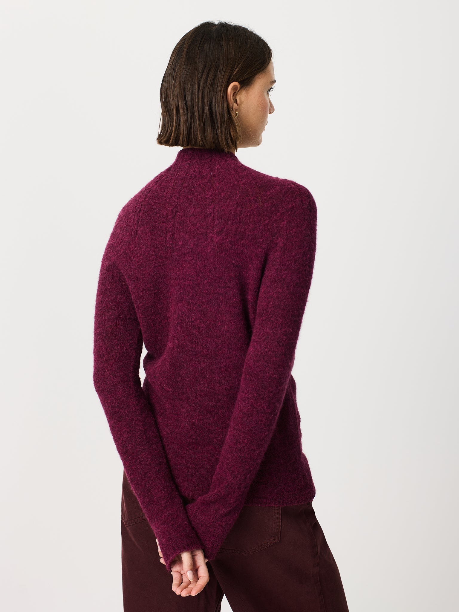 Jersey de cuello cisne con trenzas