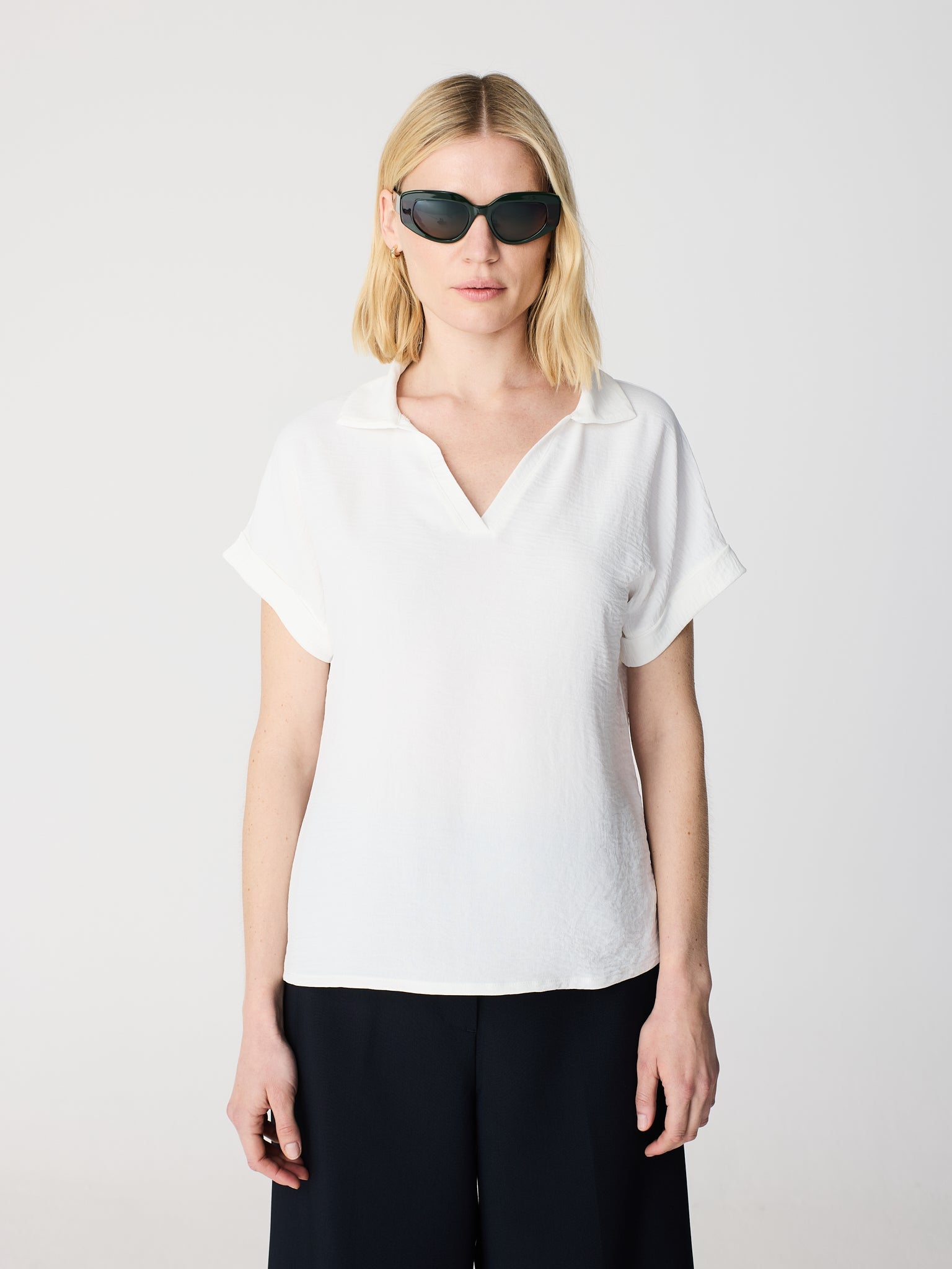 Polo neck and short sleeve blouse