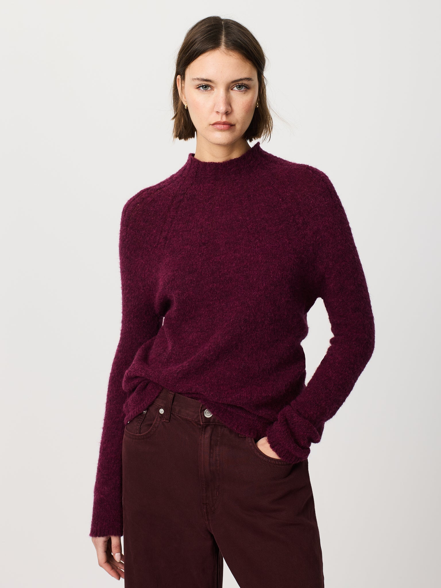 Jersey de cuello cisne con trenzas