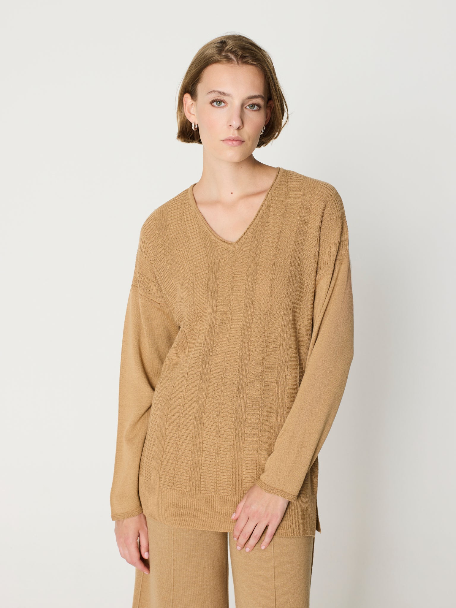 Jersey tipo túnica cuello pico y manga larga