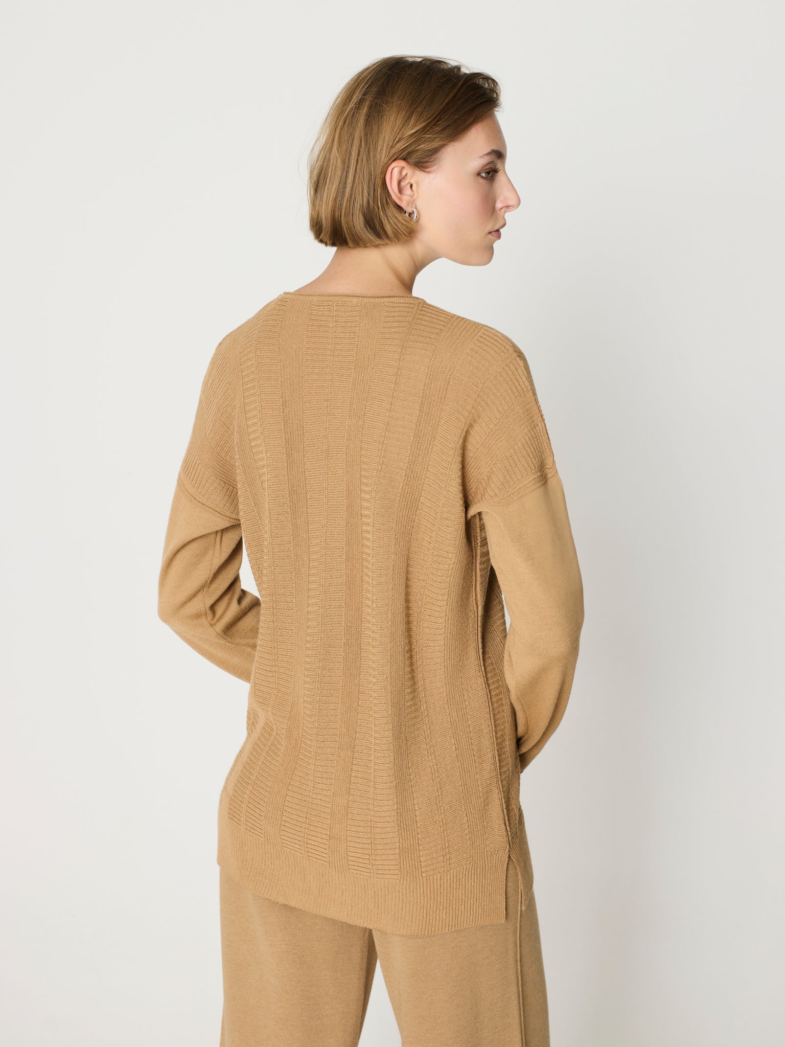 Jersey tipo túnica cuello pico y manga larga