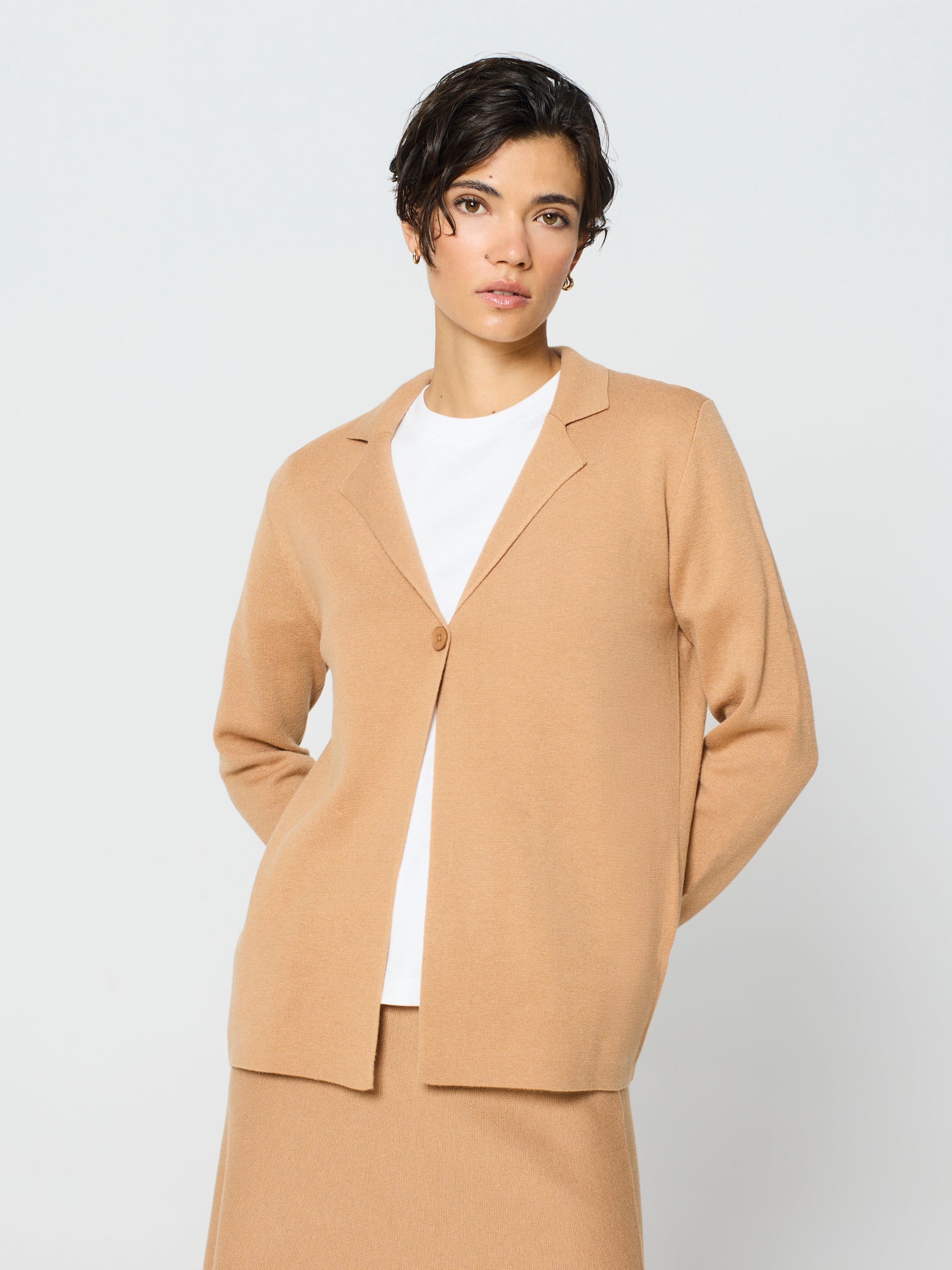 Chaqueta cuello solapa con un botón