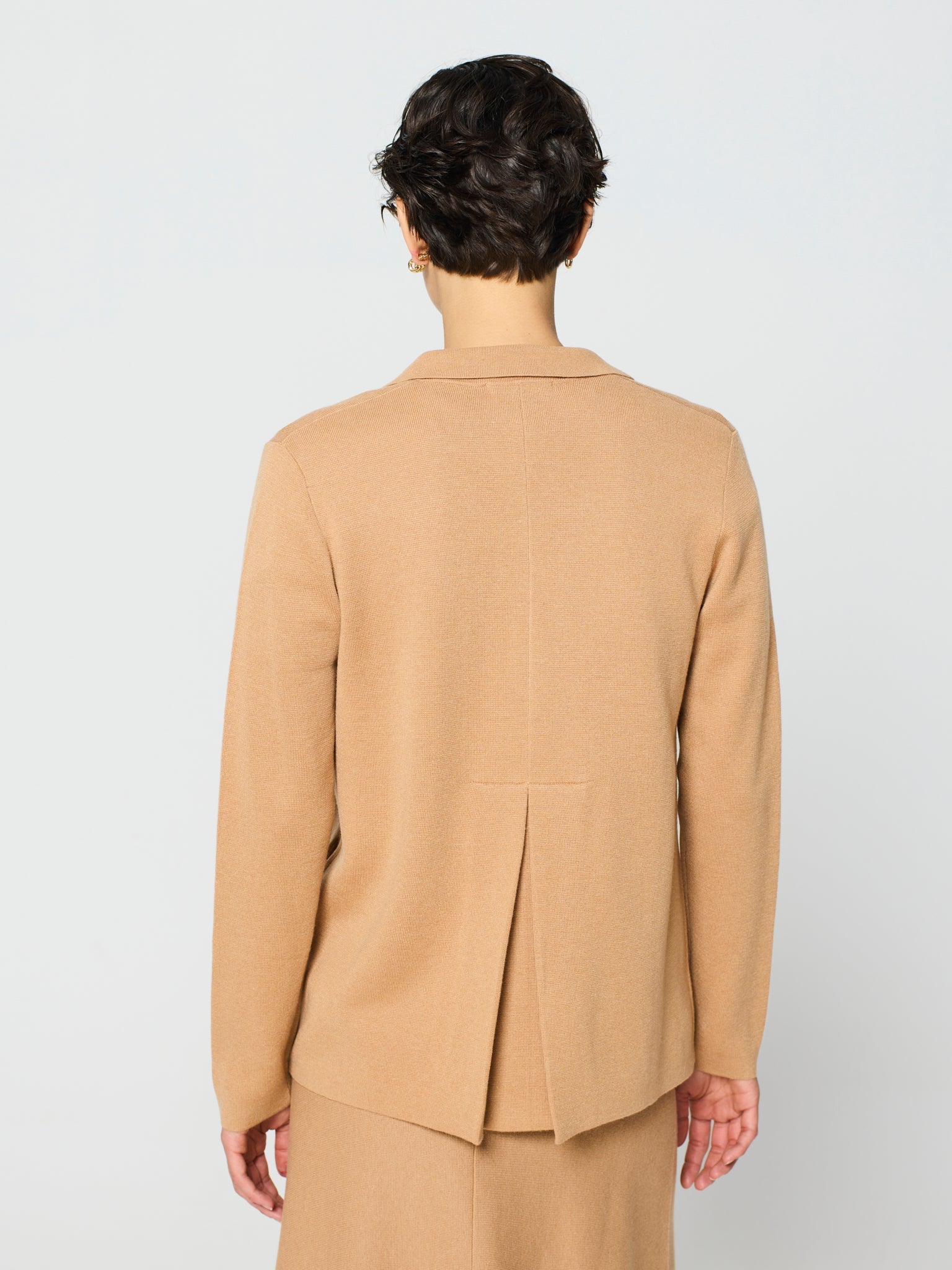 Chaqueta cuello solapa con un botón